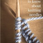 knitting needles with pale purple yarn.