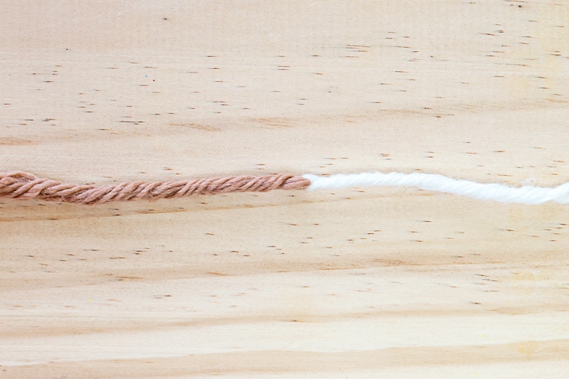 Two strands of yarn joined using the Russian Join.