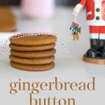 A stack of gingerbread button cookies threaded with baker's twine.