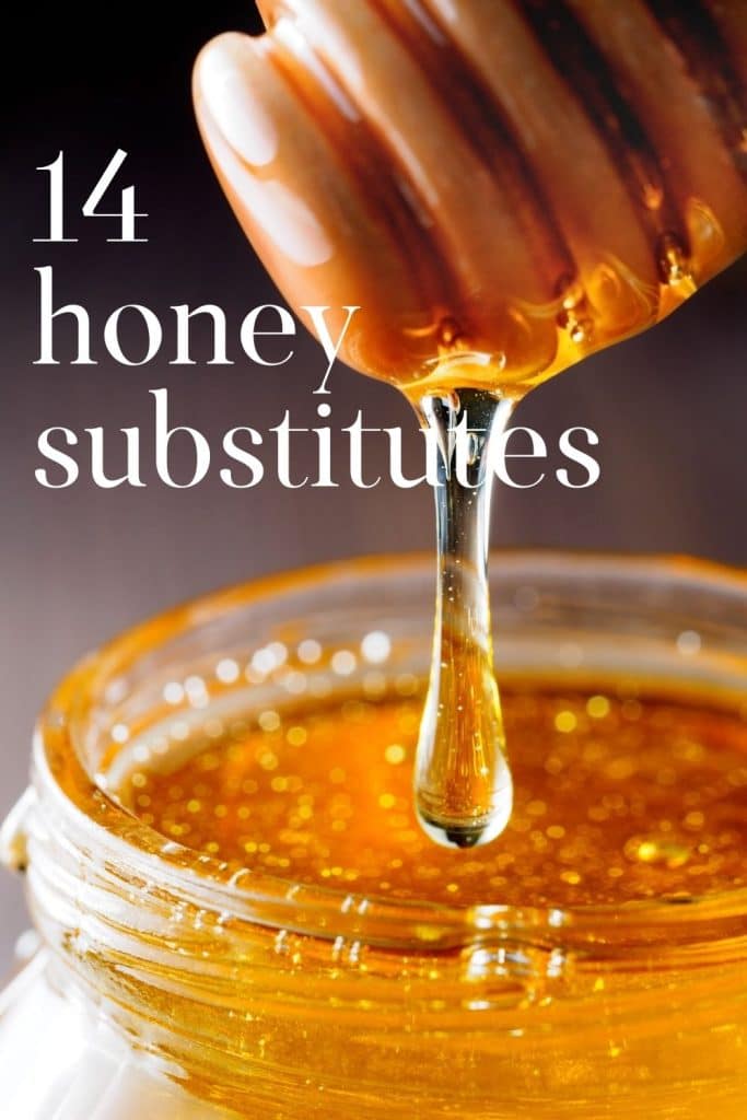 Honey stirrer dripping honey into a glass jar.