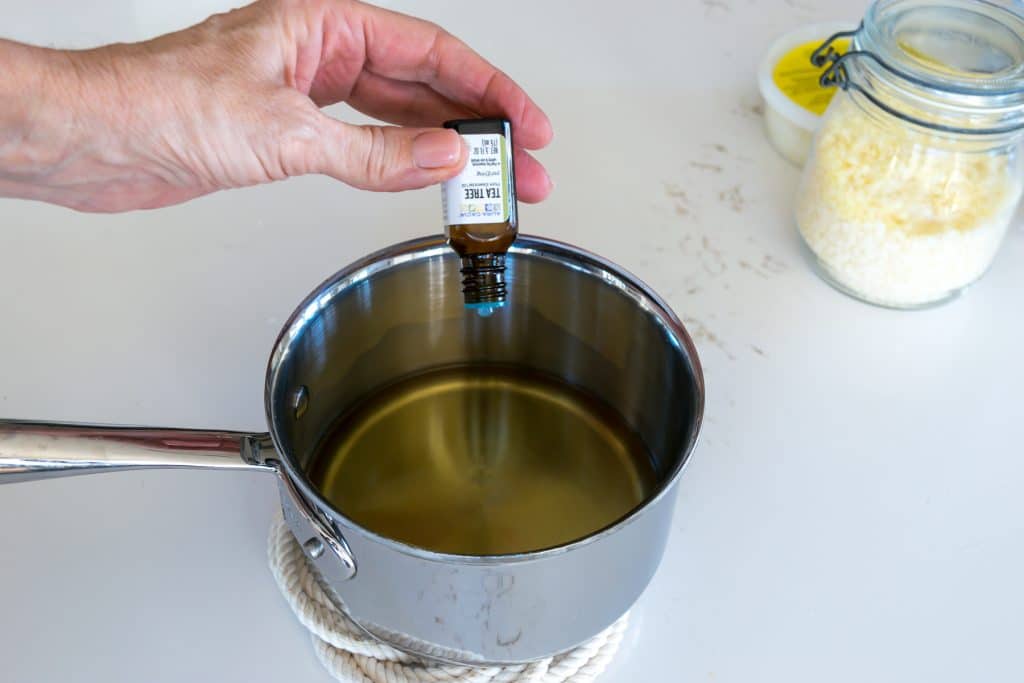 Add essential oils to warm heel blam.