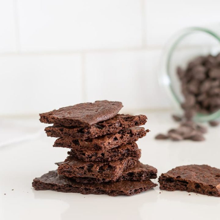 Stacked pieces of brownie brittle.