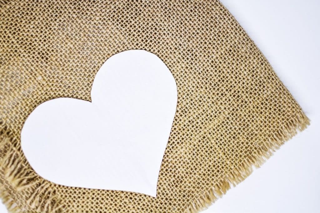 A heart cut out of burlap.