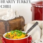 Crockpot turkey chili in a red bowl.