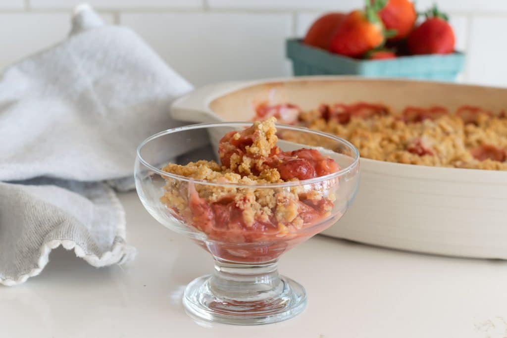 Strawberry Crumble in a glass bowl.