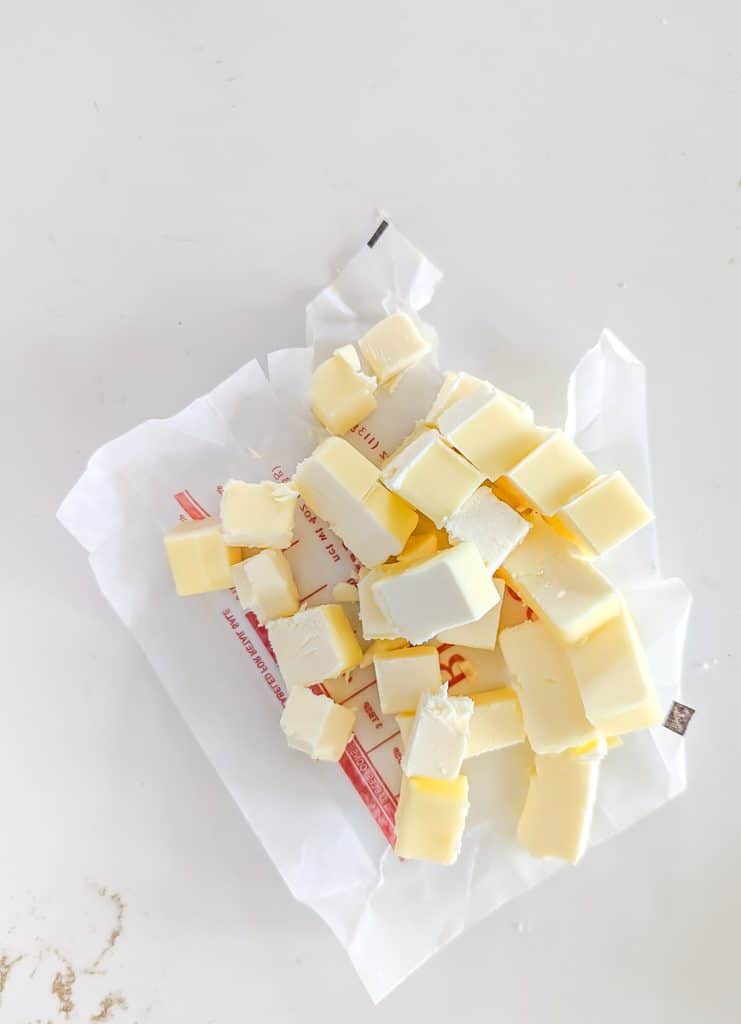 Chilled butter cut in cubes.