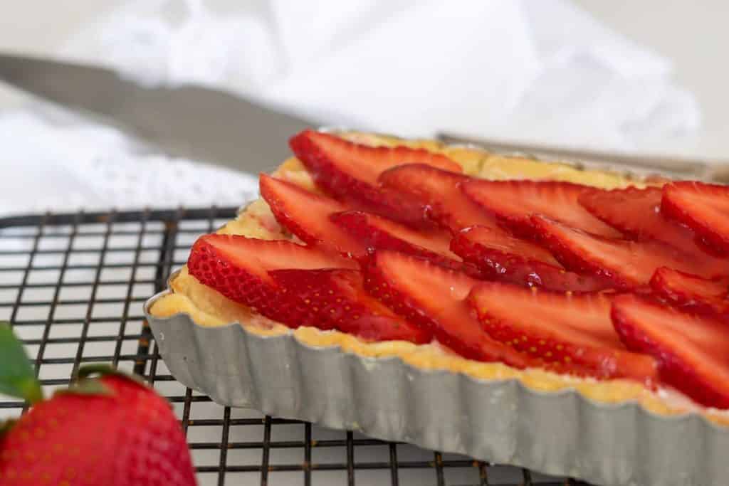One end of a strawberry tart.