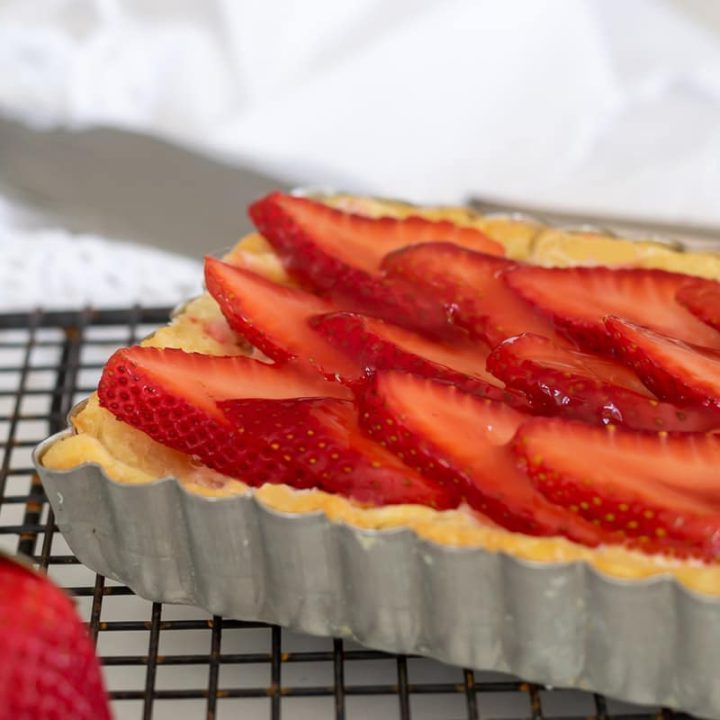 One end of a strawberry tart.