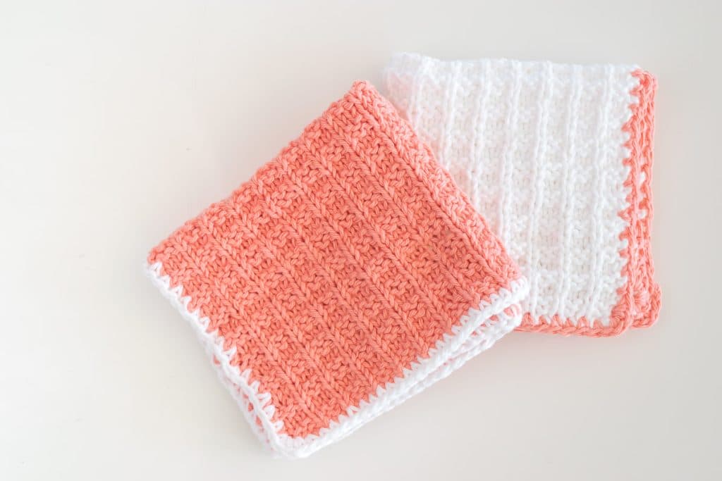 White and peach knit washcloths
