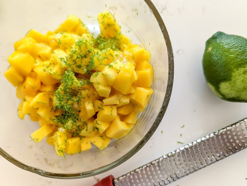 Fresh mango and lime zest in Mango Habanero Salsa Recipe.