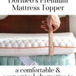 Measuring stick showing 4" of support with Dormeo's Premium Mattress Topper
