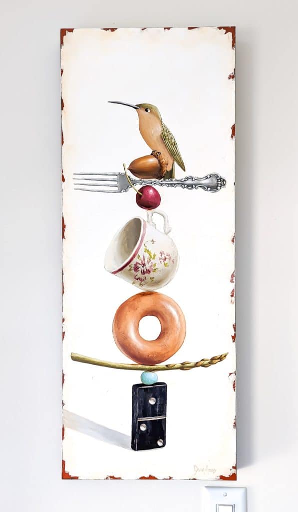 Painting of bird on acorn on fork on cherry on teacup on donut on asparagus on egg on domino