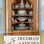 Pine hutch with MacKenzie-Child's serveware, showing how to decorate a kitchen hutch.