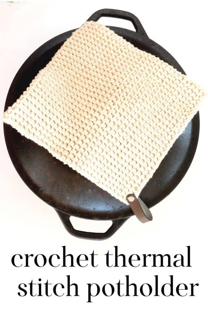 Overhead shot of Crochet Potholder on a black pot.