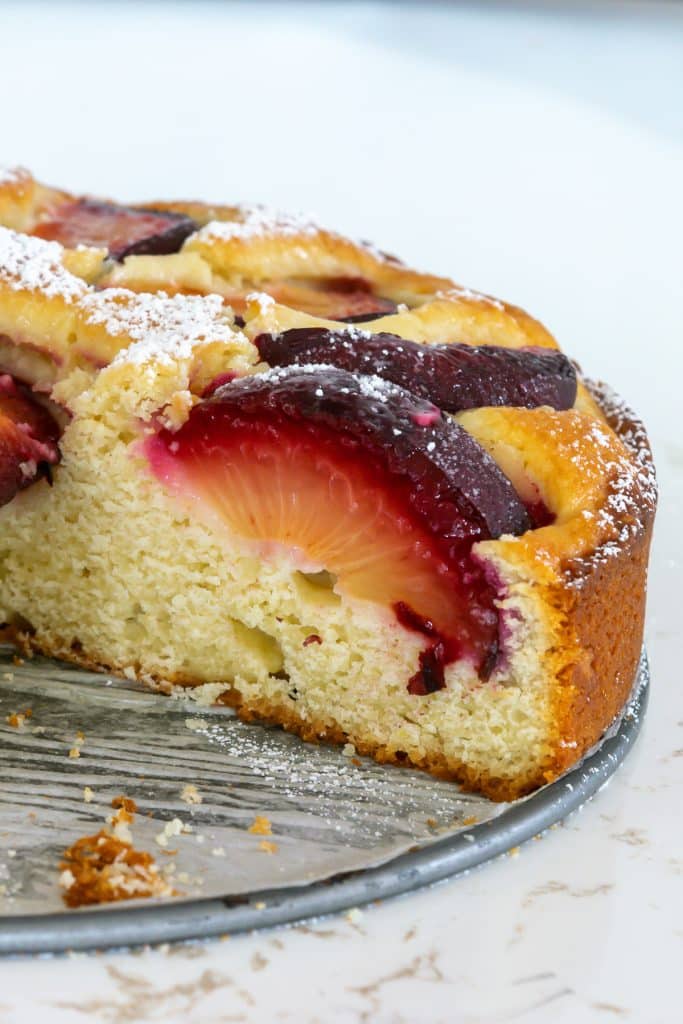 Closeup of plum in cake.