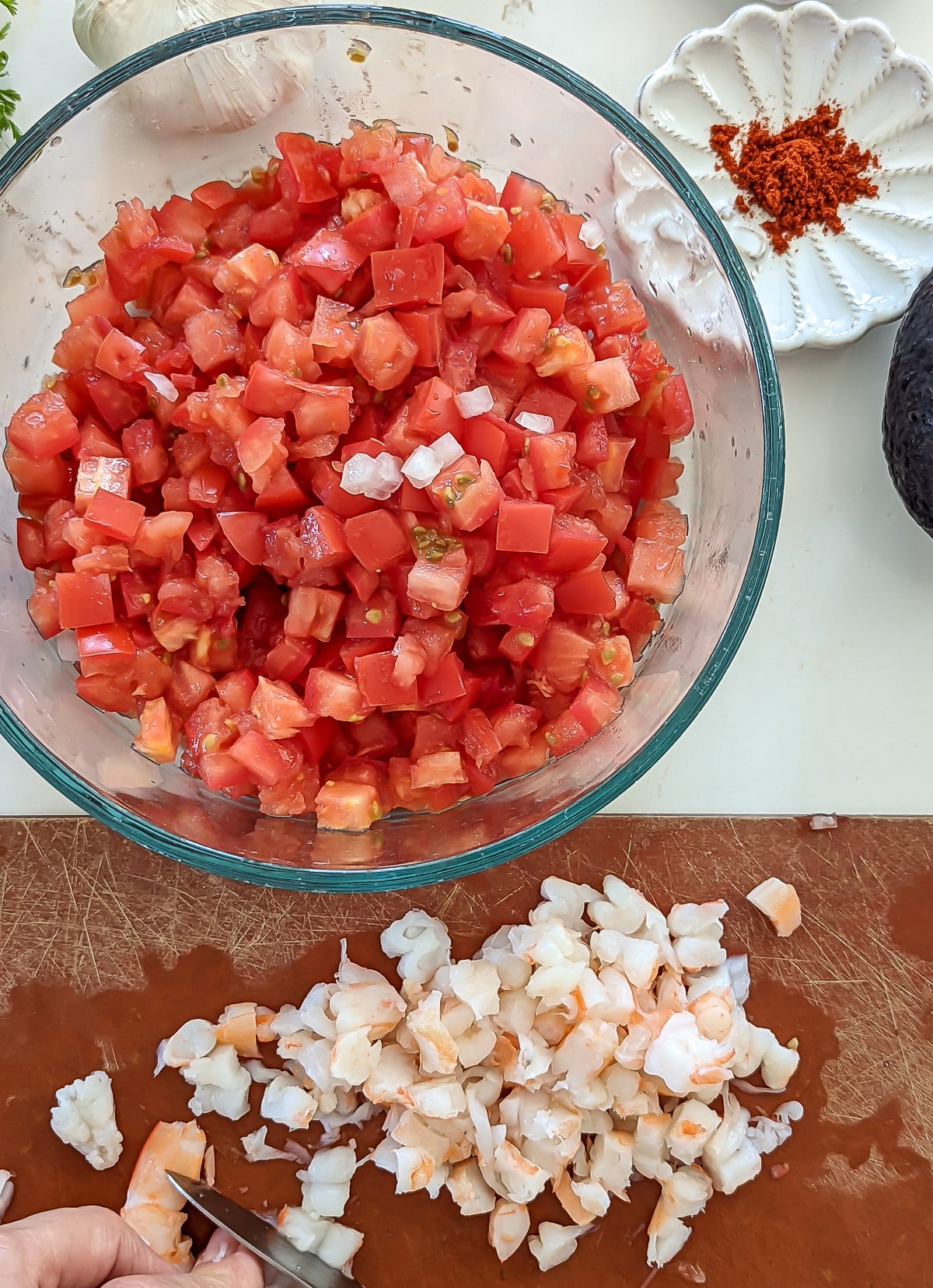 Diced tomatoes and diced shrimp.