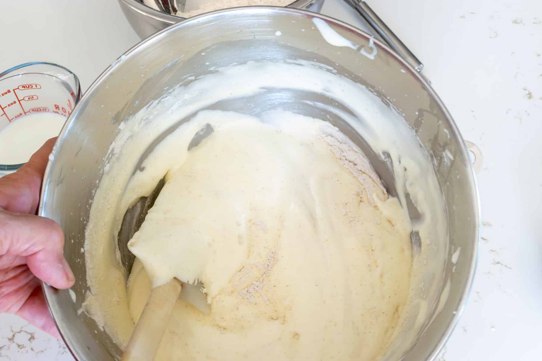 Fold flour into egg sugar mixture.