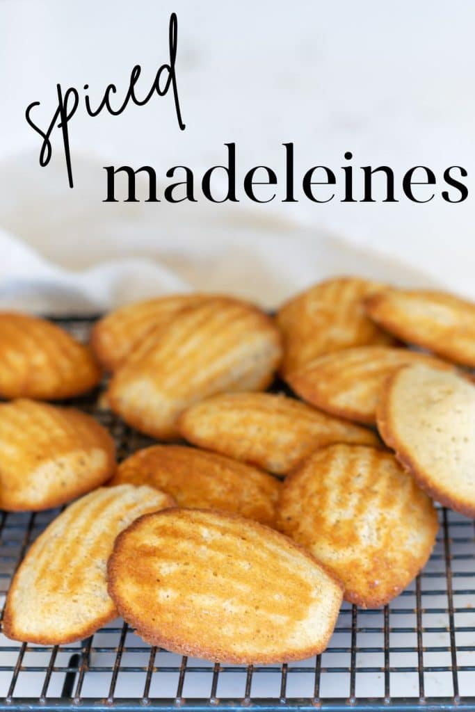 Spiced Madeleines on a cooling rack.