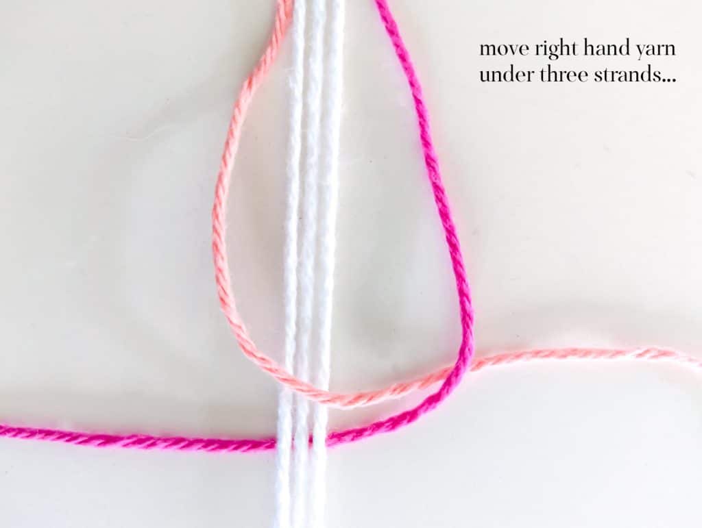 Visual instructions explaining how to tie a square knot using white, pink and salmon yarn.
