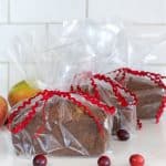 Mini Loaves of Cranberry Apple and Apple Bread in bread bags with red rick rack ribbon.