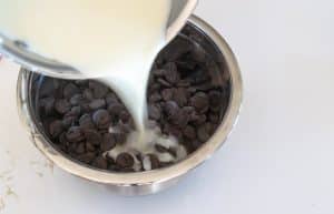 Cream poured over chocolate chips.