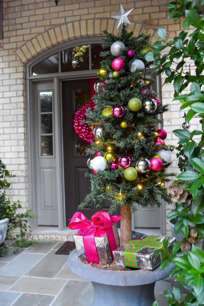 Pink and Green Ornament garland on Christmas tree at front porch.