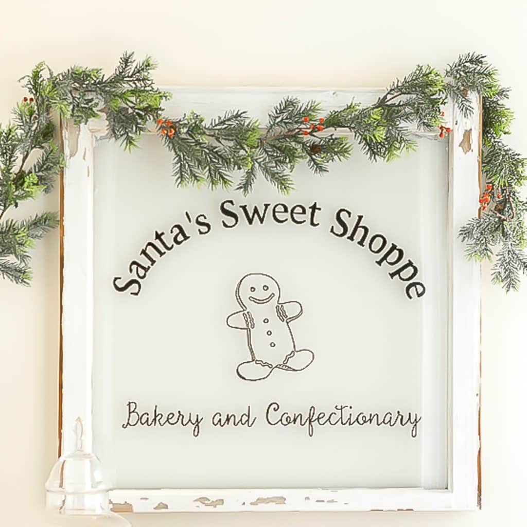 A picture of a gingerbread man with Santa\'s Sweet Shoppe written above the gingerbread man.