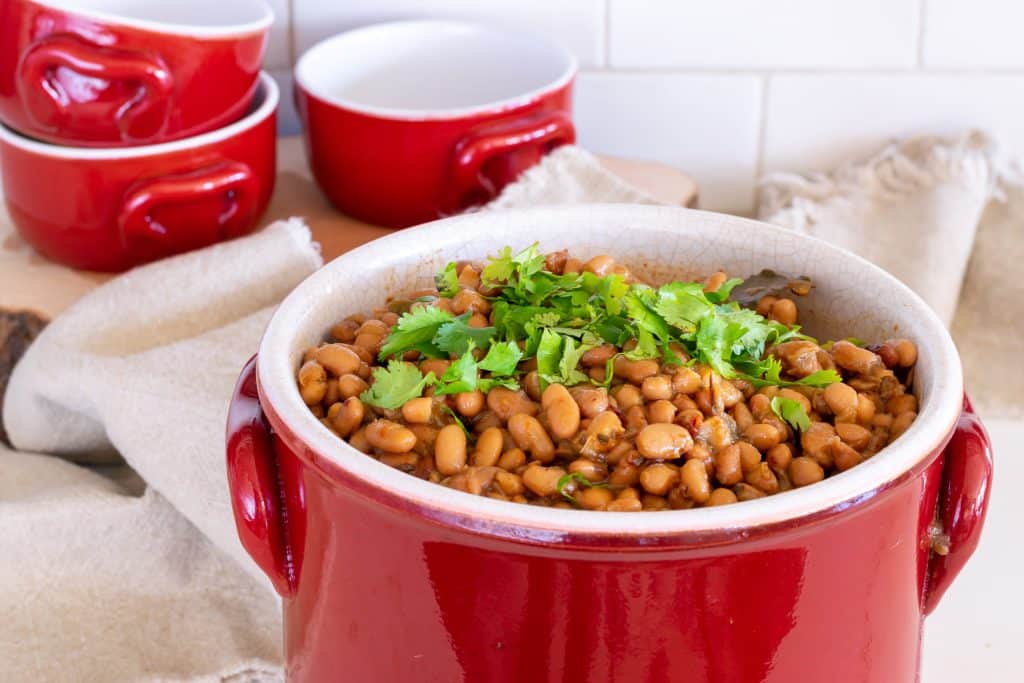 Pinto Beans in a red crock.