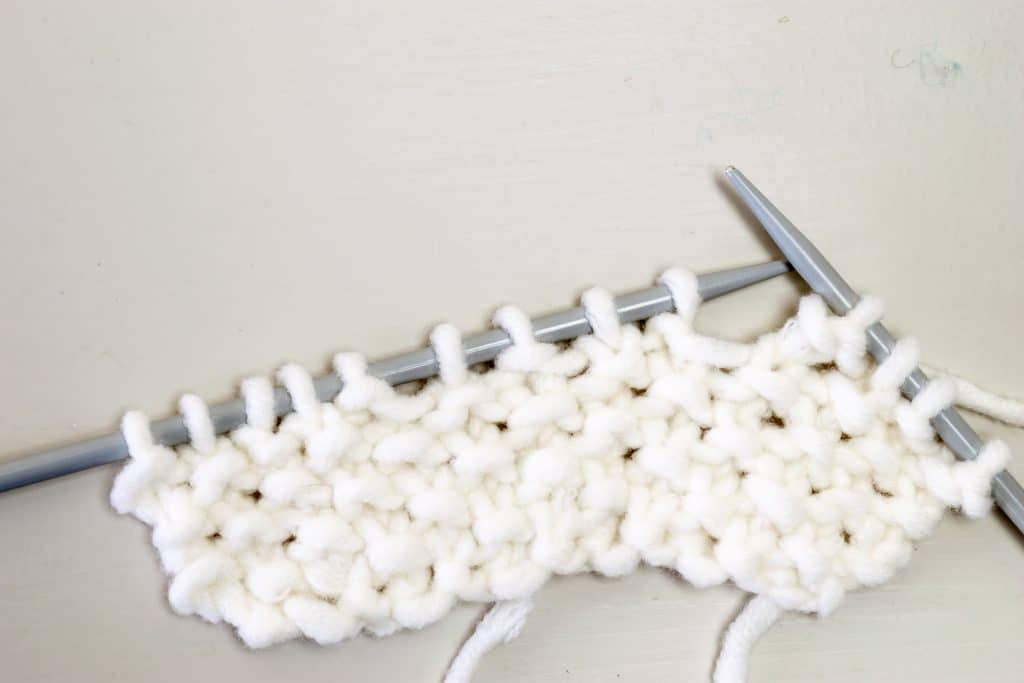 Seed Stitch on knitting needles.