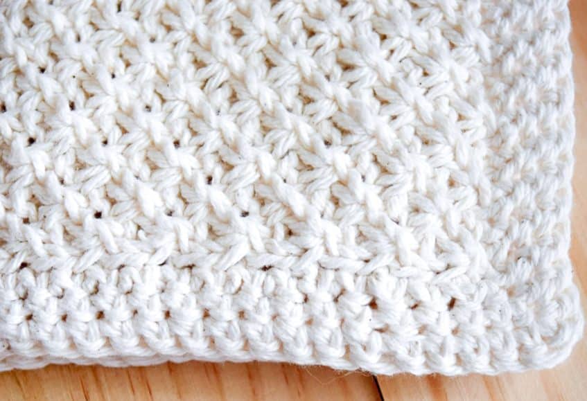 Daisy Stitch Knit Washcloth Pattern · Nourish and Nestle