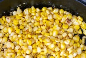 Corn browning in pan.