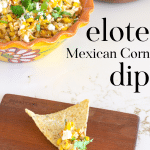 Elote (Mexican Corn) dip in a bowl and on a chip on a wooden plate.