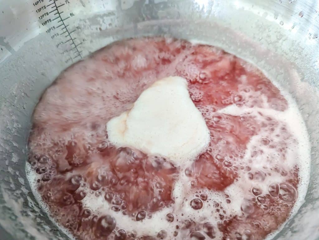 Rhubarb jam at a rolling boil.