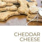 Cheddar Cheese Dog Treats on a wooden surface.