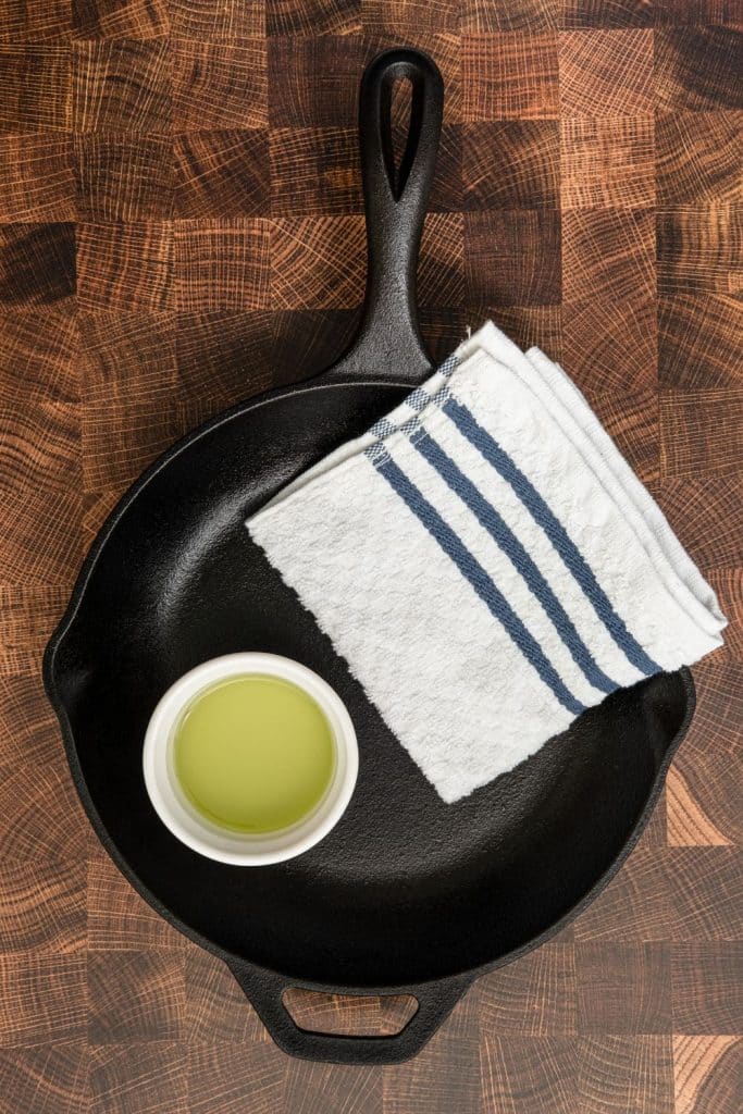 cloth and oil in a cast iron pan