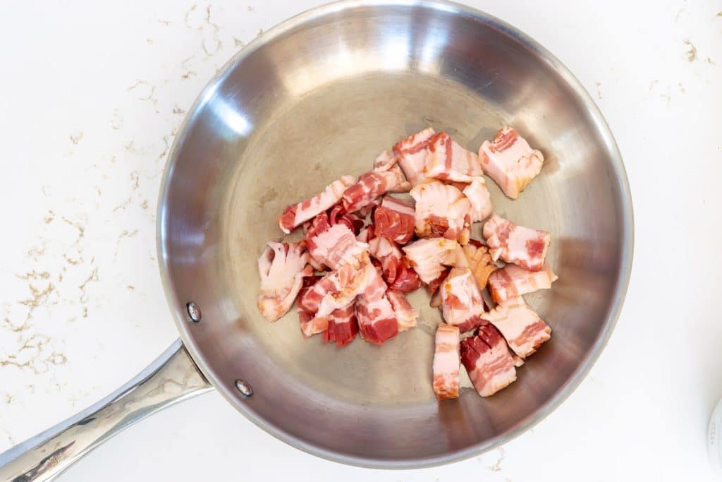 Add bacon to skillet.
