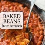 Baked beans in a cast iron skillet.
