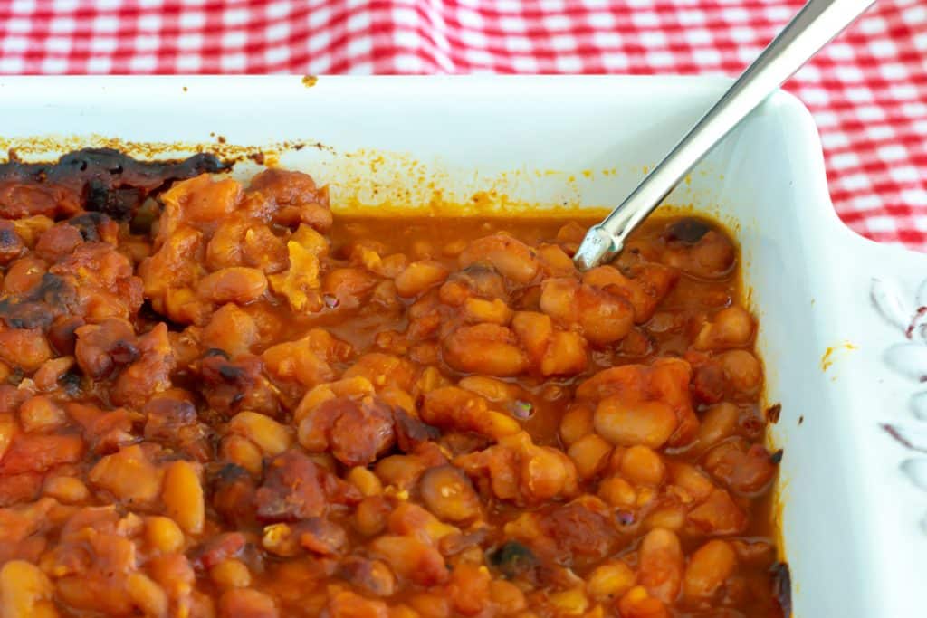 Baked Beans in a white baking dish.