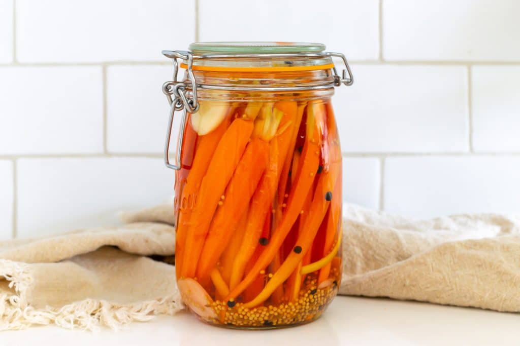 A jar of pickled carrots