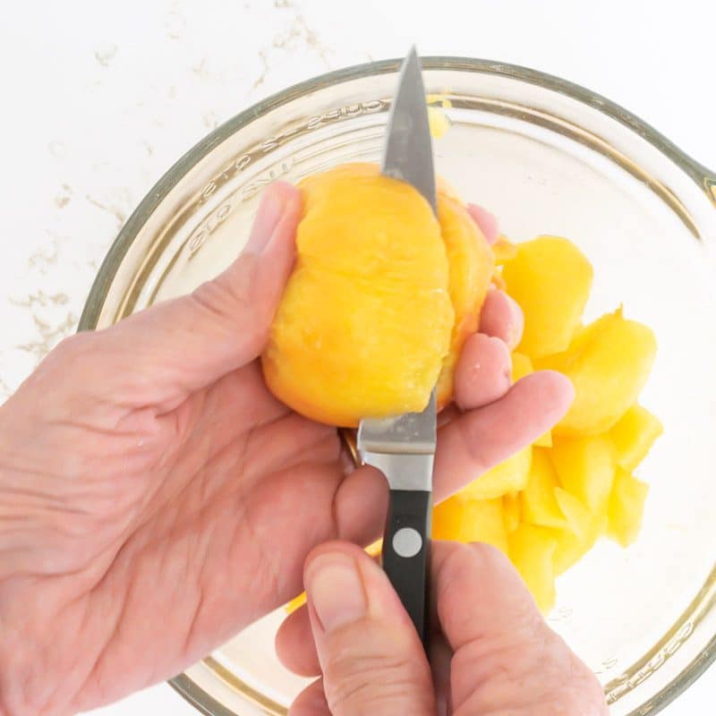 cut peaches into smaller pieces.