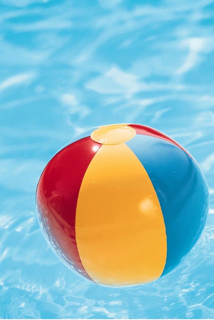 Inflatable ball in a pool.