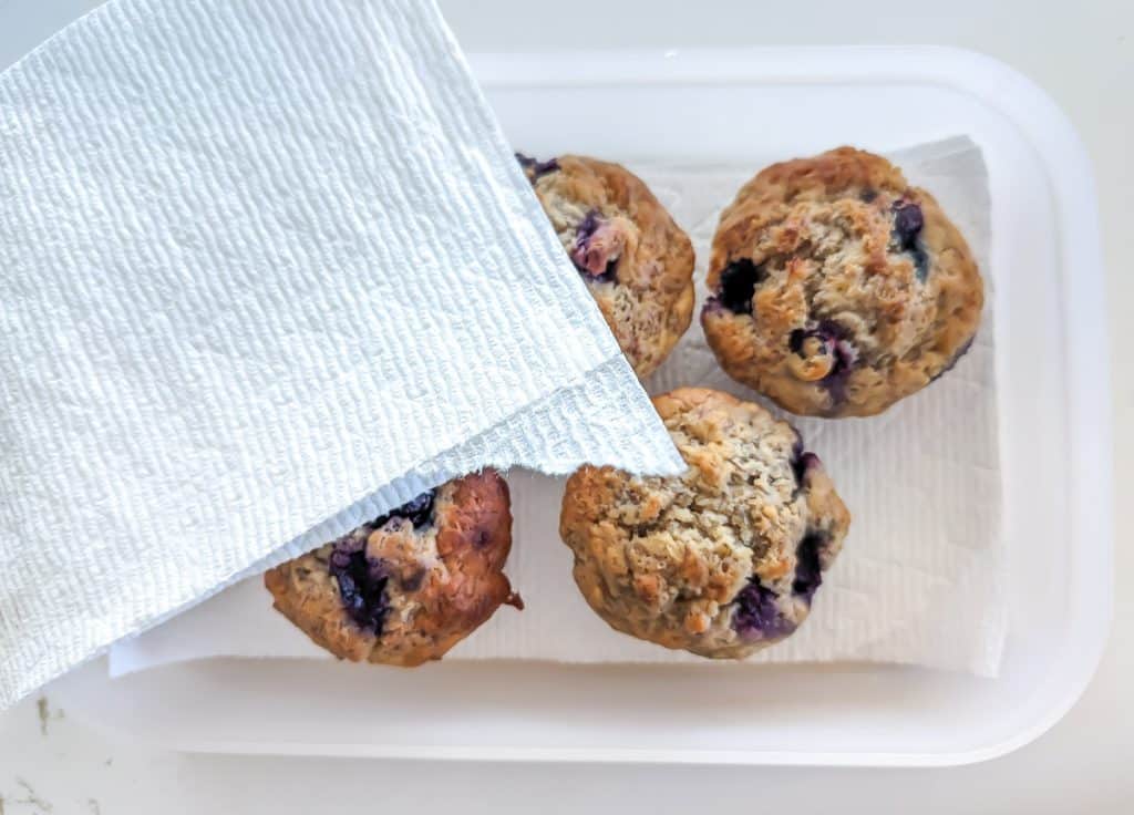 muffins in paper towel lined, air tight container.