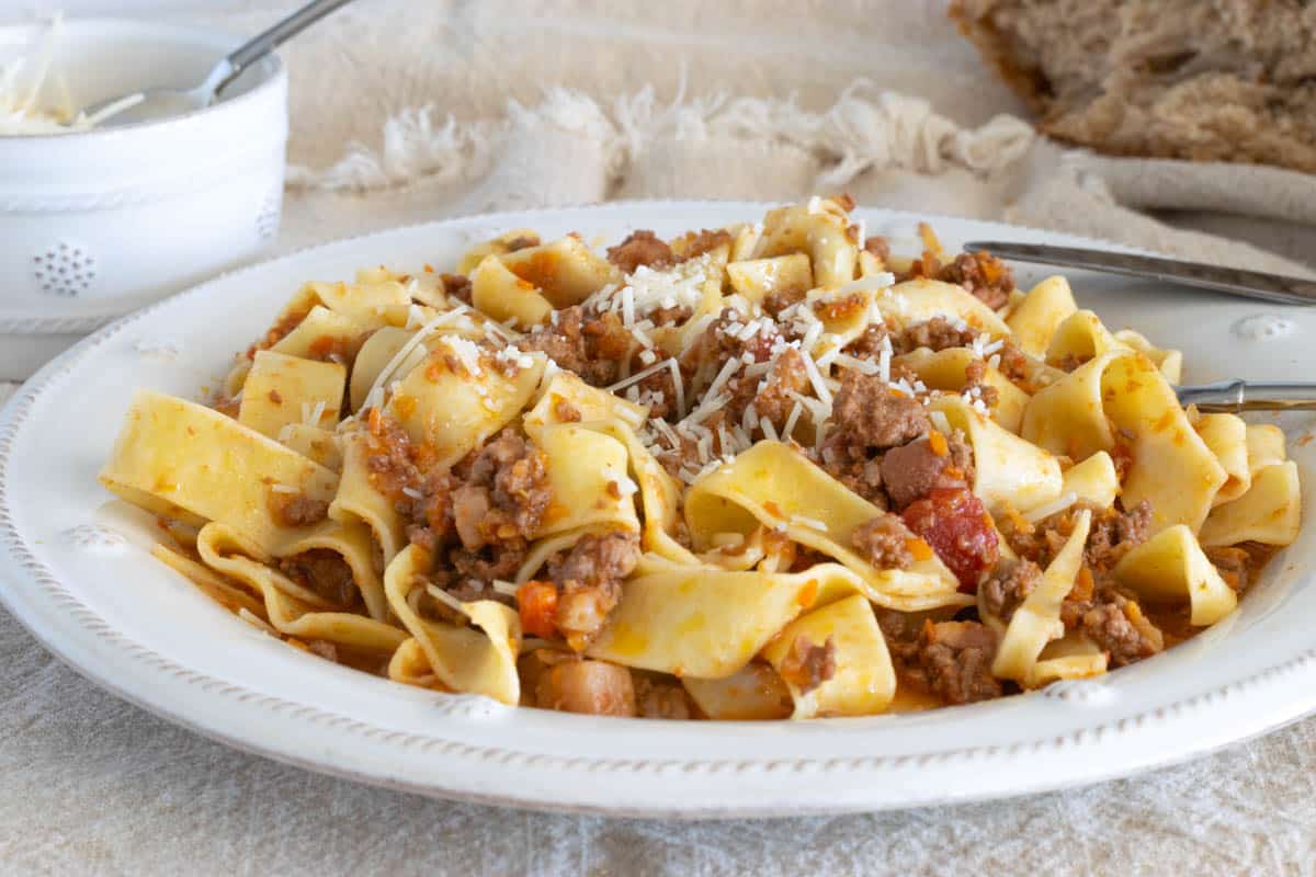 A plate of pappardelle with ragu alla bolognese.