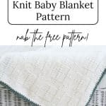 White easy knit plaid baby blanket on white wicker chest.