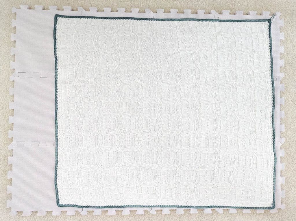 Blanket on blocking mat.