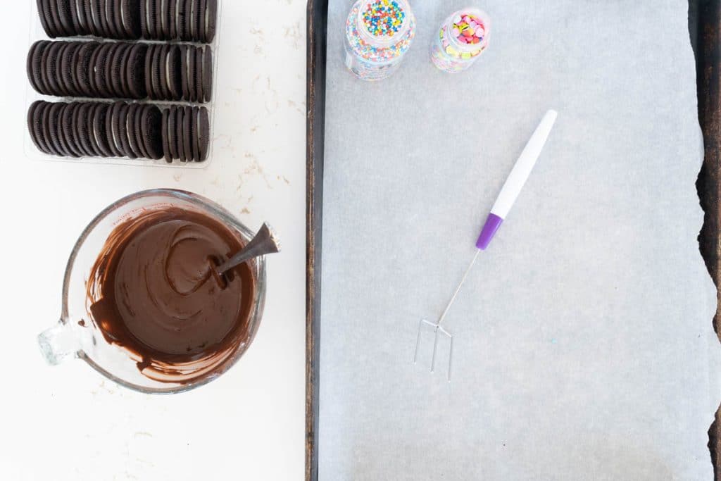 Set up for dipping Oreos in chocolate.