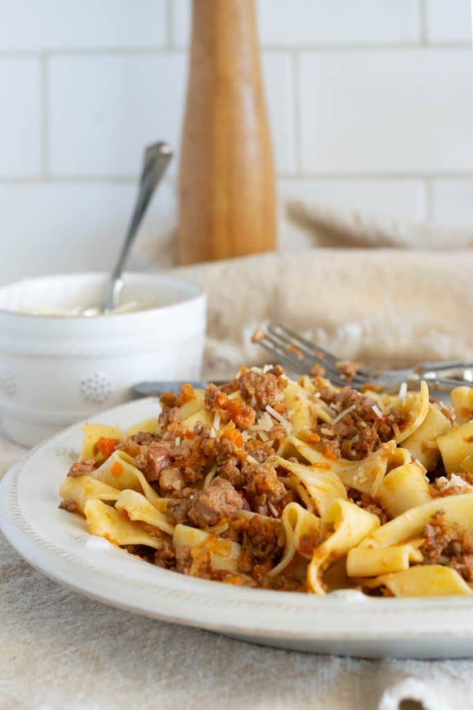 Ragù alla Bolognese with pappardelle on a plate.