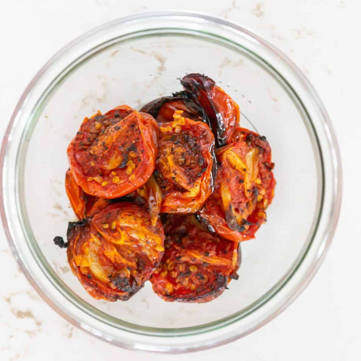 Fire Roasted Tomatoes in a glass jar.