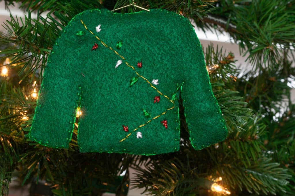 Christmas Felt Sweater with string of lights.