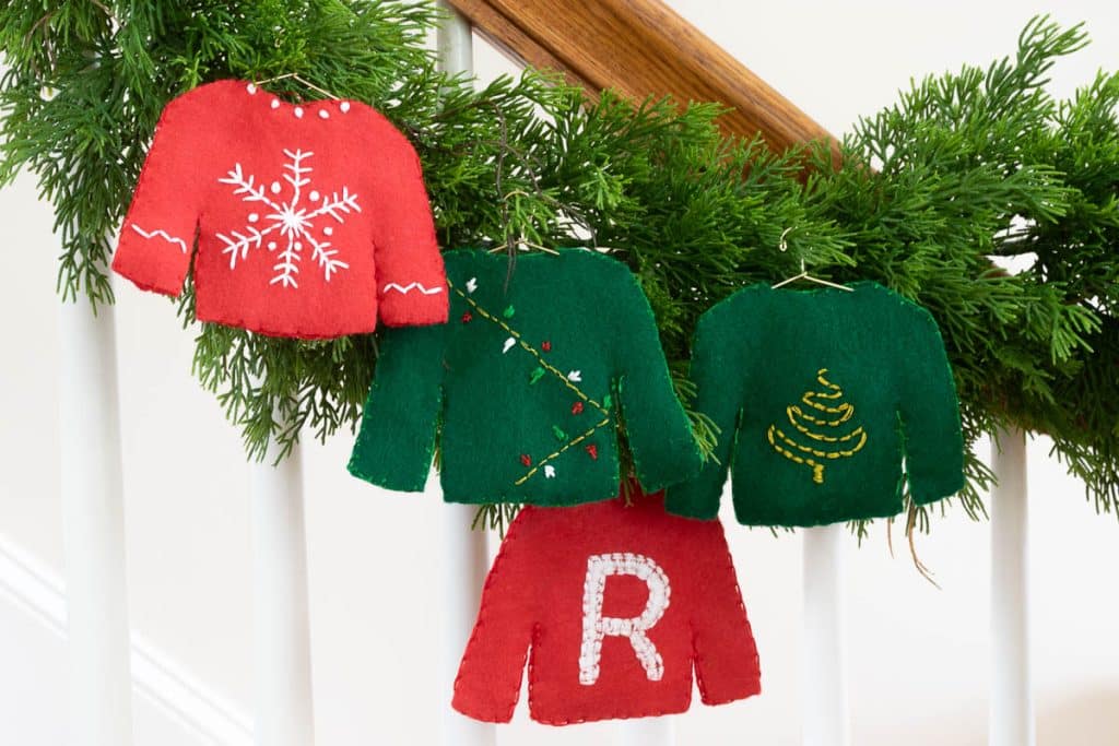 Felt sweater ornaments on garland.